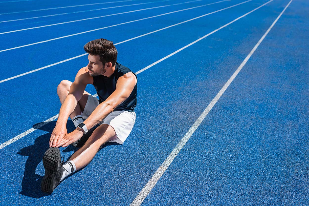 Man Doing Warm Up Exercises