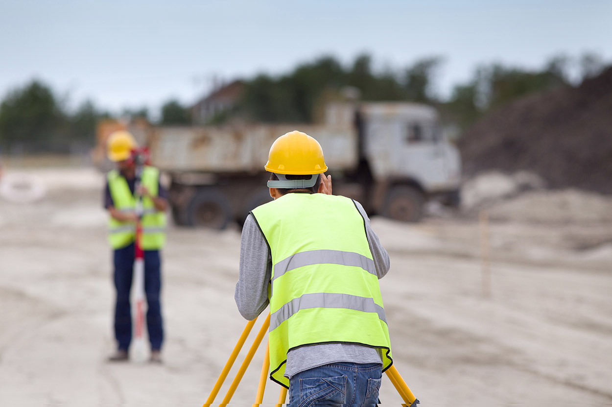 Engineers measuring roads