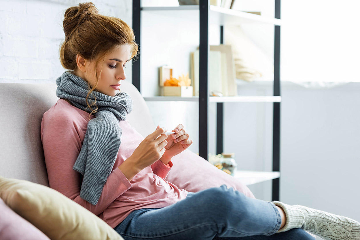 Woman checking temperature