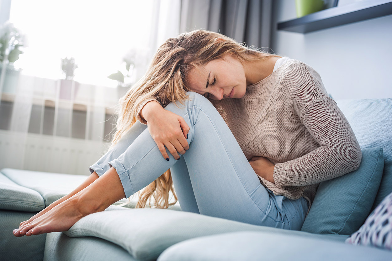 Woman having painful period