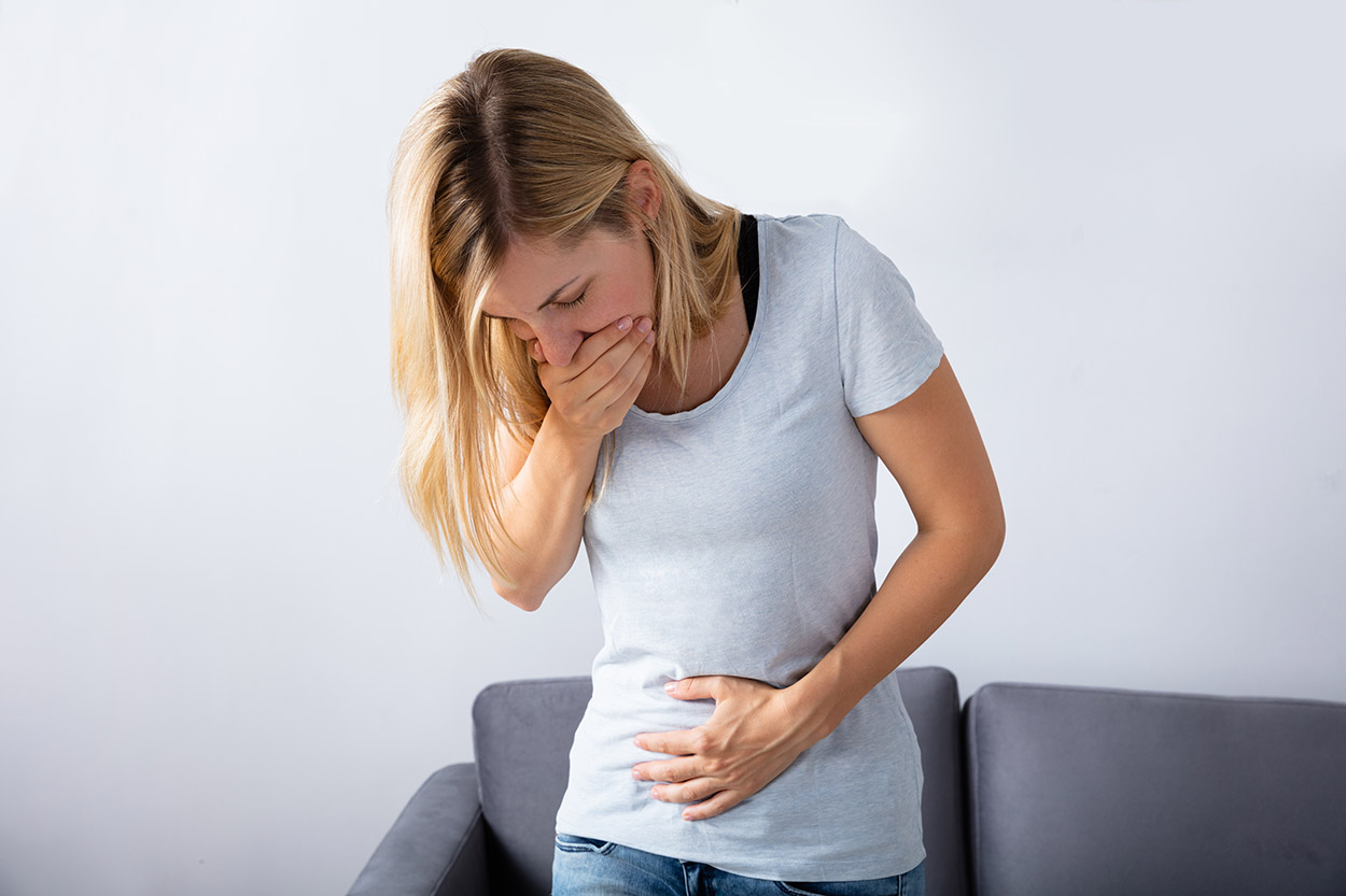 Woman feeling unwell