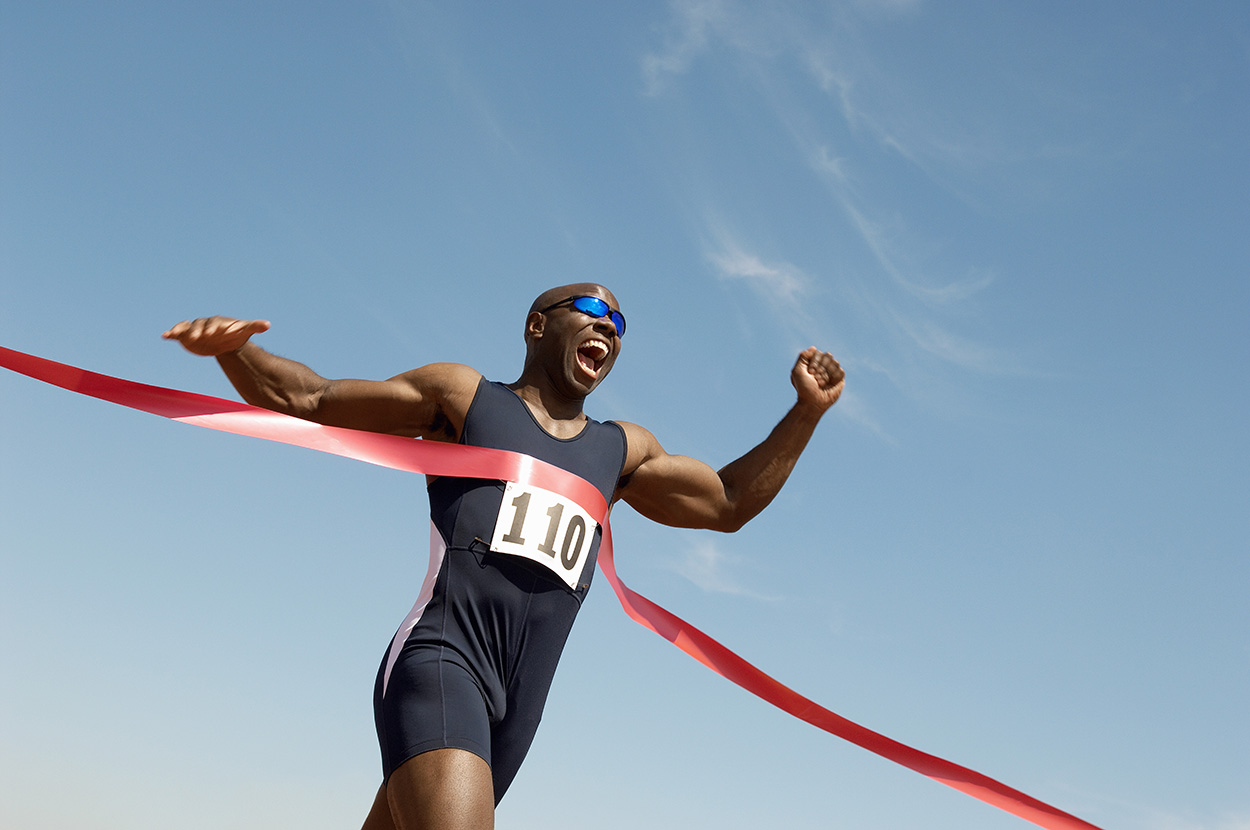 Runner Finishing First In Race