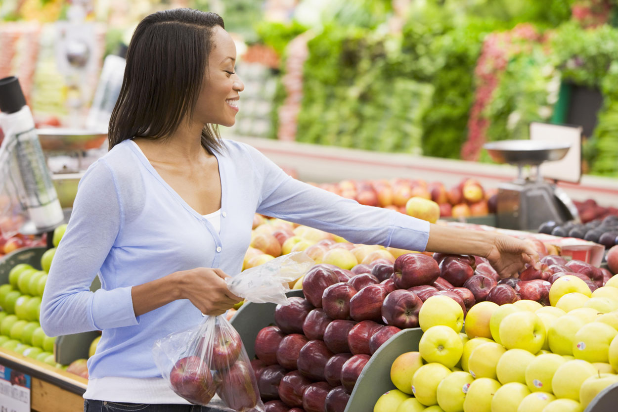 Woman Choosing Healthy in Grocery Store