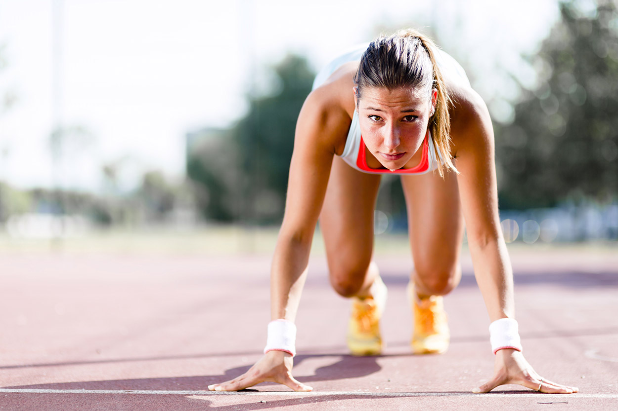 Woman Getting Into Running Stance